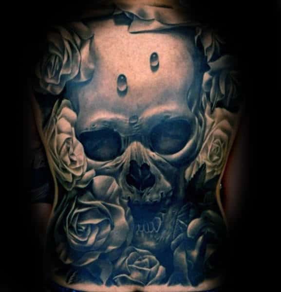 A skull and roses tattoo design with shading details