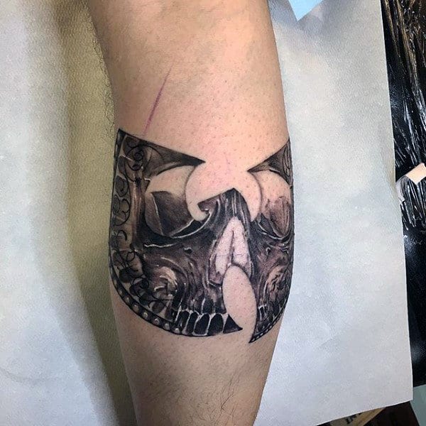 Skull Wu Tang Tattoo On Mans Leg