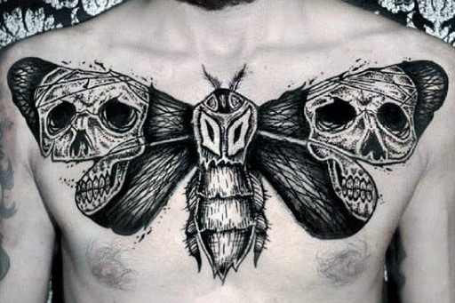 skulls-moth-wings-mens-upper-chest-tattoos