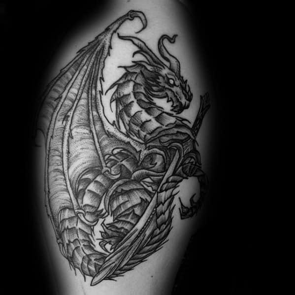 Black and white Skyrim dragon tattoo with a sword