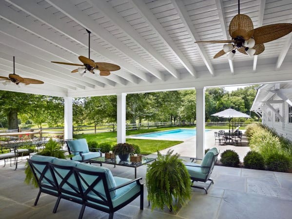 sleek white pergola patio roof with fans