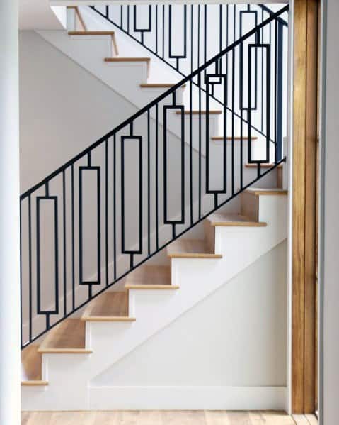 black ornate railing in modern staircase 