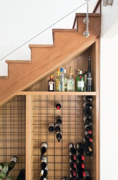 sleek under stairs wine cellar