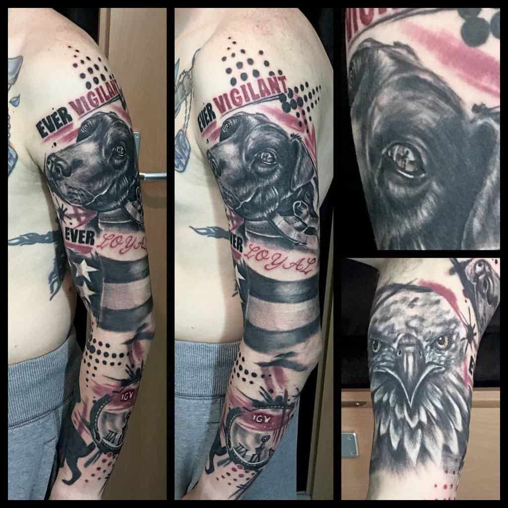 Full sleeve tattoo featuring 'IGY6,' a detailed dog portrait, eagle, American flag, and phrases 'Ever Vigilant' and 'Ever Loyal'