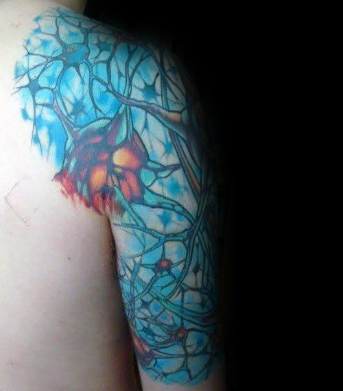 Colorful neuron tattoo on shoulder with electric blue background, fiery red-orange synapses, and intricate branching neural networks.