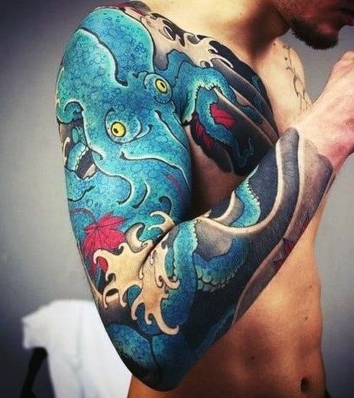 An individual with a colorful octopus tattoo sleeve on their right arm and shoulder