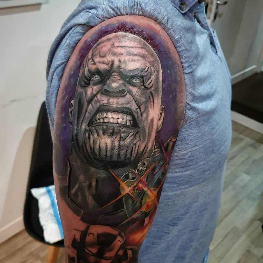 A detailed tattoo of Thanos with a fierce expression and the Infinity Gauntlet, surrounded by a cosmic background with glowing accents