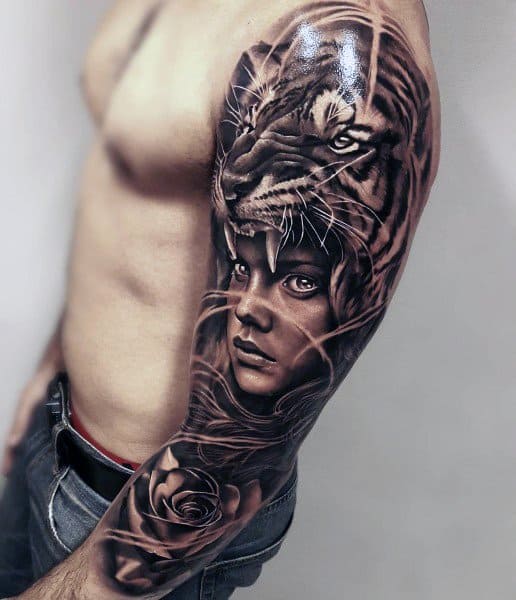 Realistic tattoo of a woman wearing a tiger headdress with a rose below, symbolizing inner strength, beauty, and fierce protection.