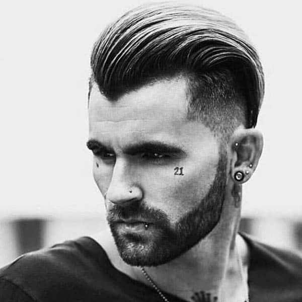 Slicked Back Medium Length Guys Haircuts For Thick Wavy Hair