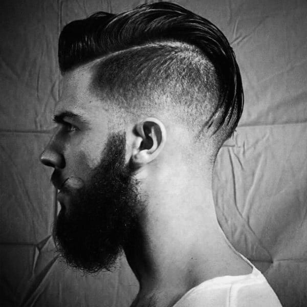 Slicked Back Mens Medium Length Undercut Hairstyle Ideas