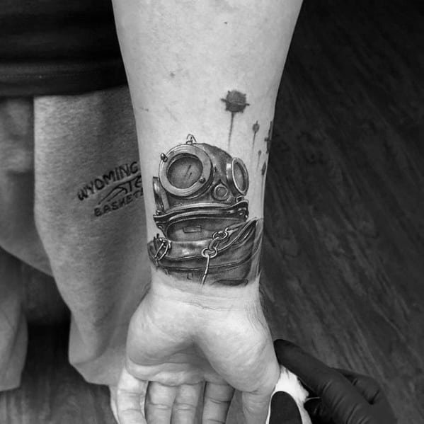 Small 3d Wrist Diving Helmet Tattoo Ideas On Guys