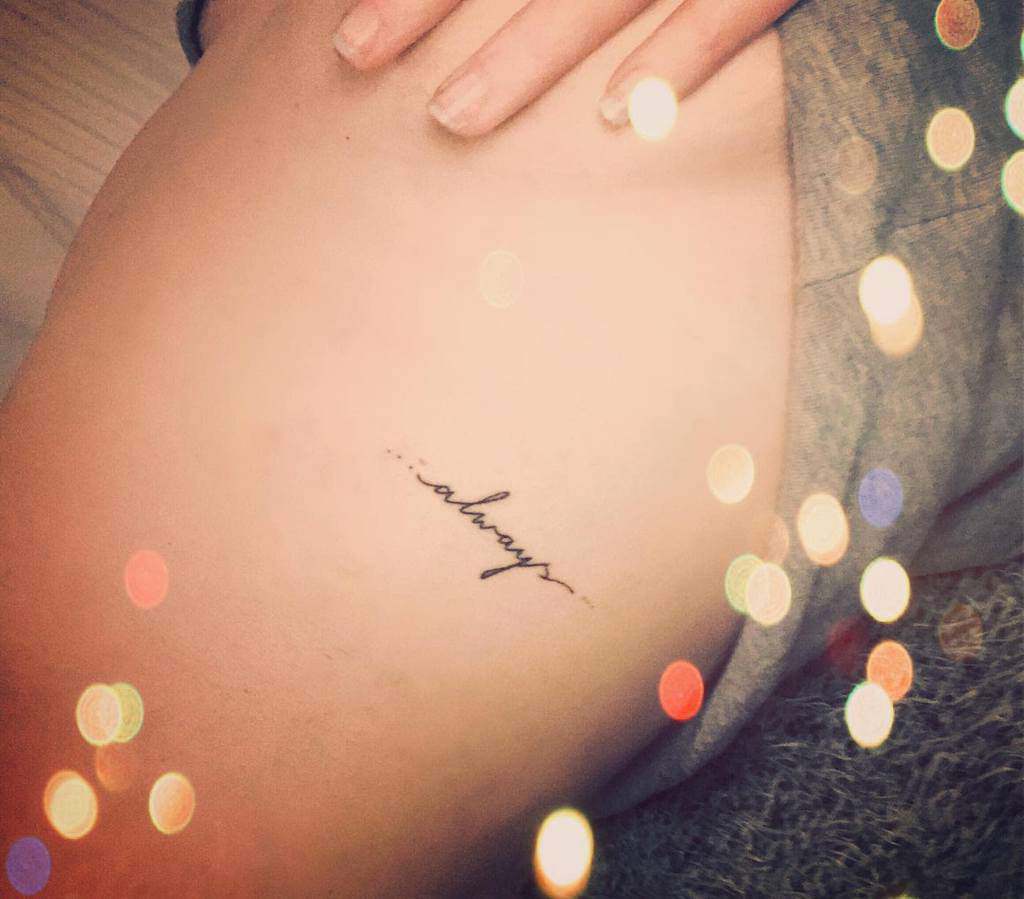 Small tattoo of the word "always" on skin