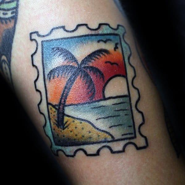 A postage stamp design featuring a tattoo of a palm tree gracing a serene beach, all set against the vivid backdrop of a stunning sunset