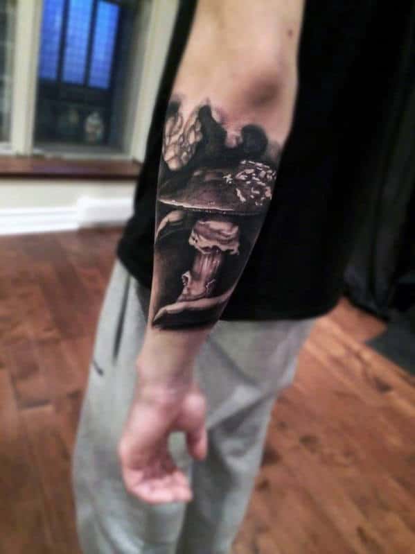 Forearm tattoo of a large mushroom with detailed shading in a realistic style