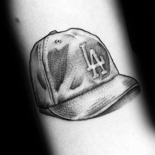 Small Black And Grey Shaded Mlb Baseball Hat Dodgers Male Tattoo Ideas