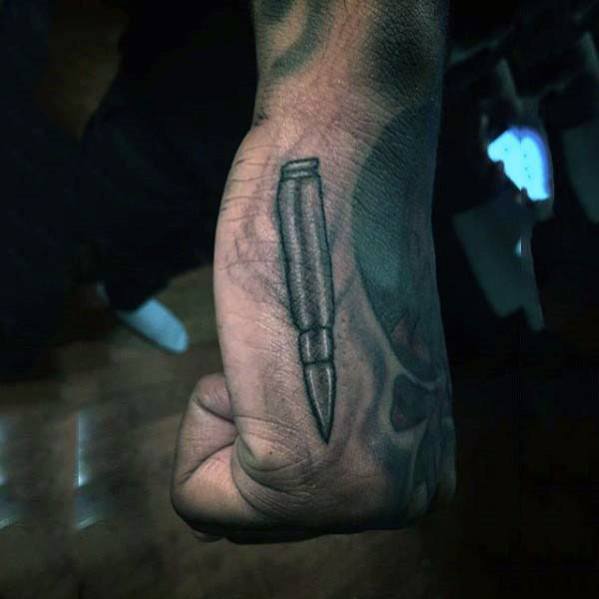 Small Bullet Mens Hand Tattoo Designs