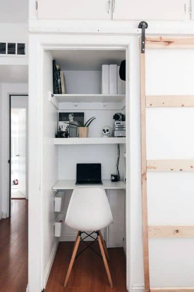 small closet office with sliding barn door