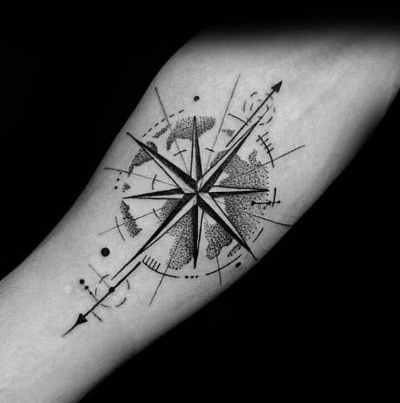 Geometric compass tattoo with fine-line details and a world map overlay, combining precision and artistry for a modern, adventurous design.