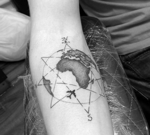 Compass and world map tattoo with geometric details and an airplane, symbolizing a passion for travel and global exploration.