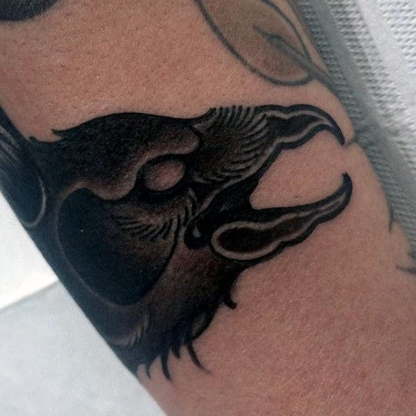 Small Crow Black Ink Tattoos For Men On Forearm