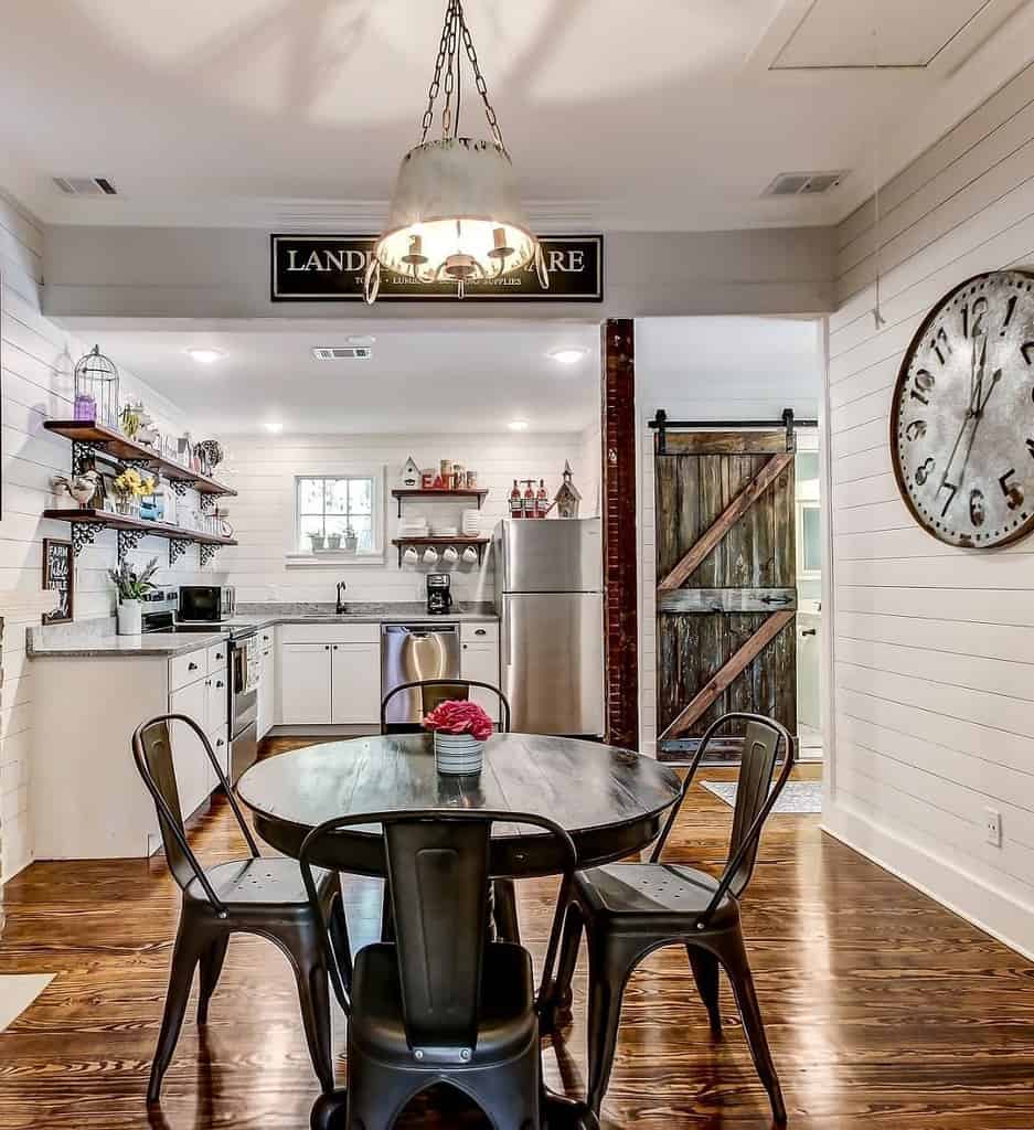 rustic kitchen dining room vinyl flooring barn door dining table and four chairs