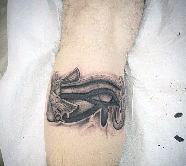 Small Eye Of Horus Quarter Sleeve Tattoo On Leg Calf For Men