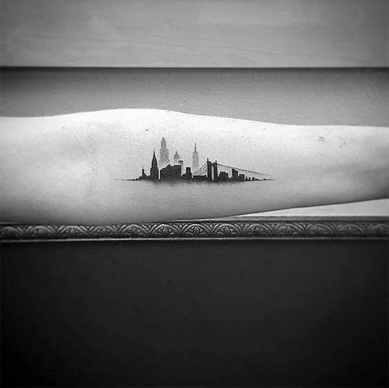 Small Forearm Male Skyline Tattoos