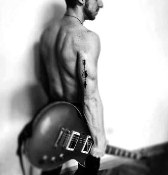 Small Guitar Back Of Arm Tattoos For Guys