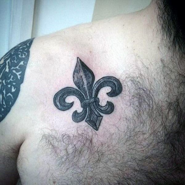 Small Guys Fleur De Lis Upper Chest Tattoo