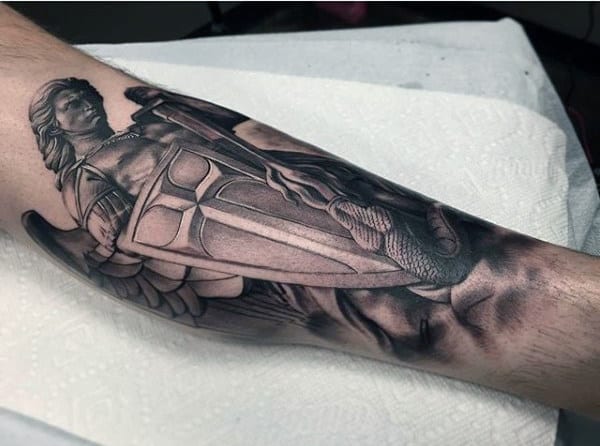 Small Guy's Tattoo Of Saint Michael With Shield
