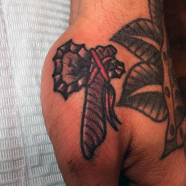 Small Guys Tomahawk Hand Tattoo Above Knuckles