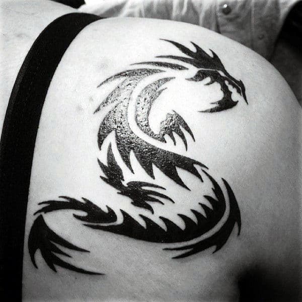 Small Guys Tribal Dragon Tattoos On Shoulder Blade