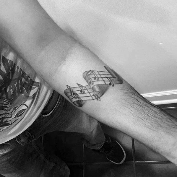 Small Inner Forearm Mens Tattoo Music Staff Design