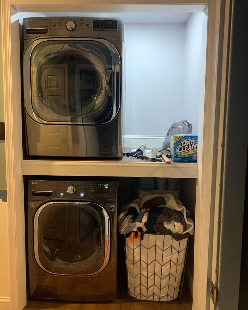 small laundry closet dirty clothes basket 