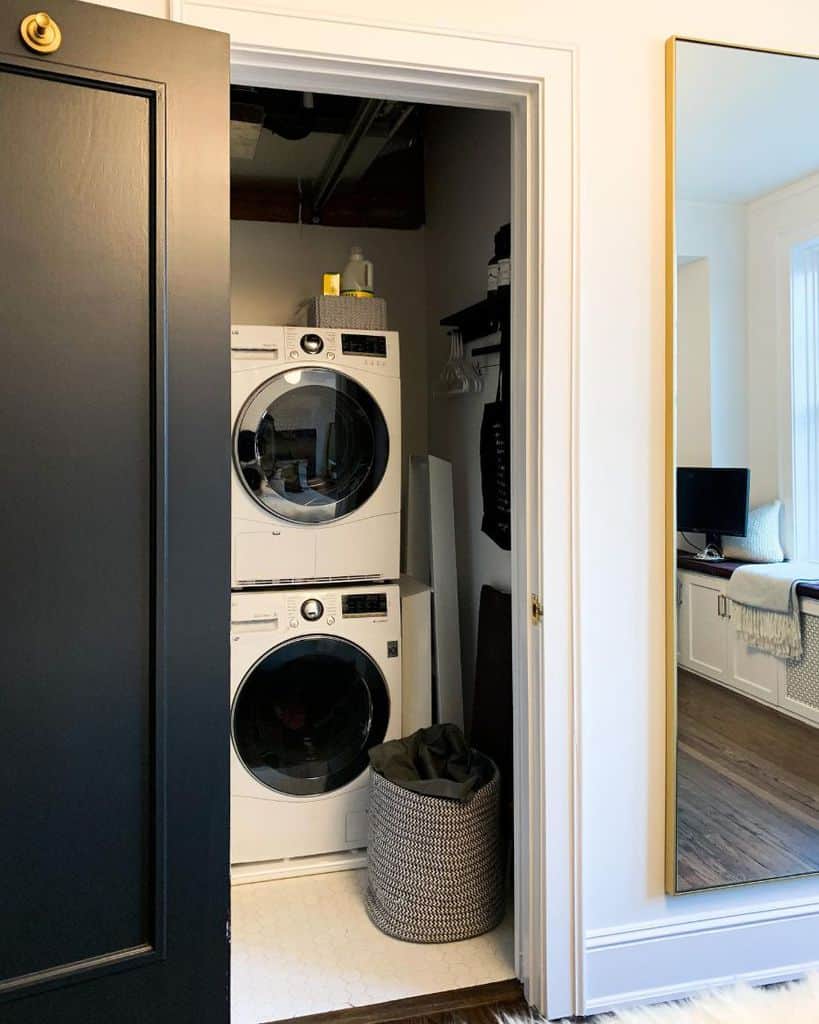 small laundry closet black door