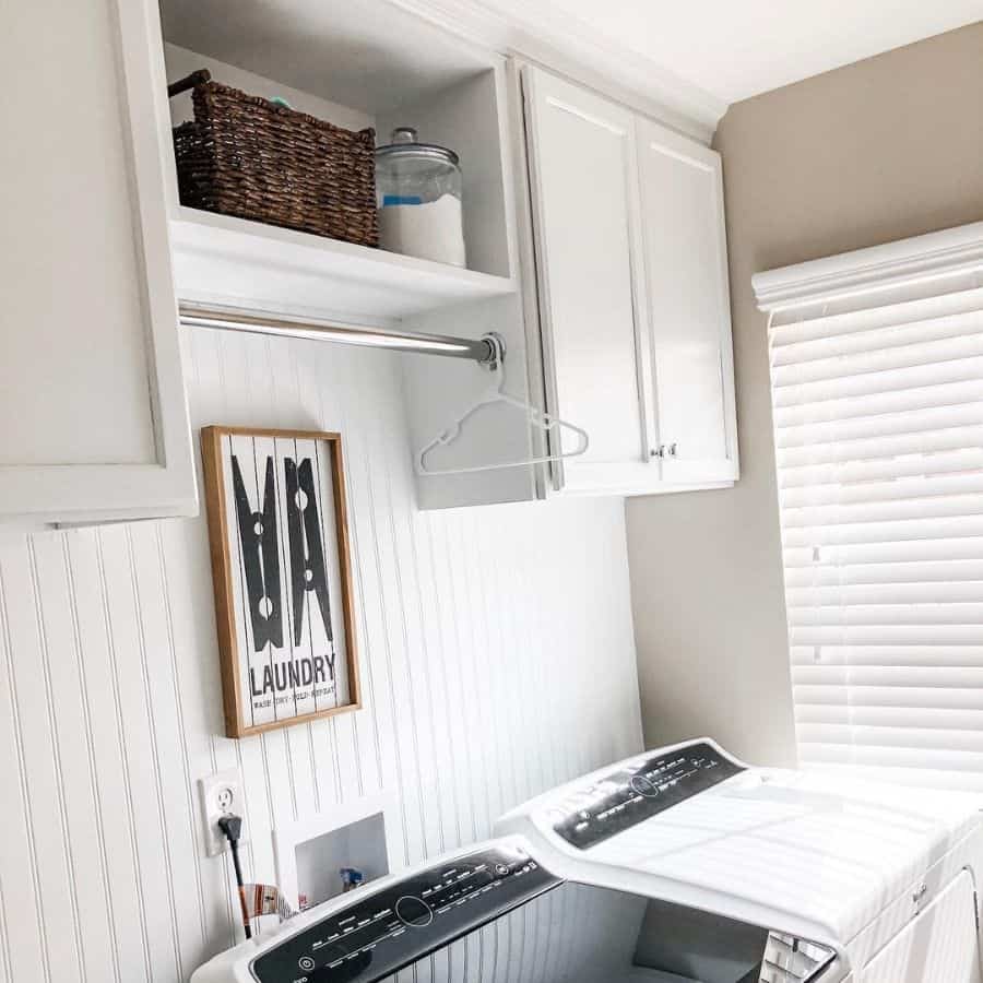 small farmhouse laundry with white shiplap walls