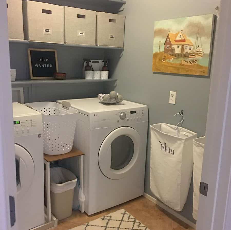 small laundry with basket and bag storage
