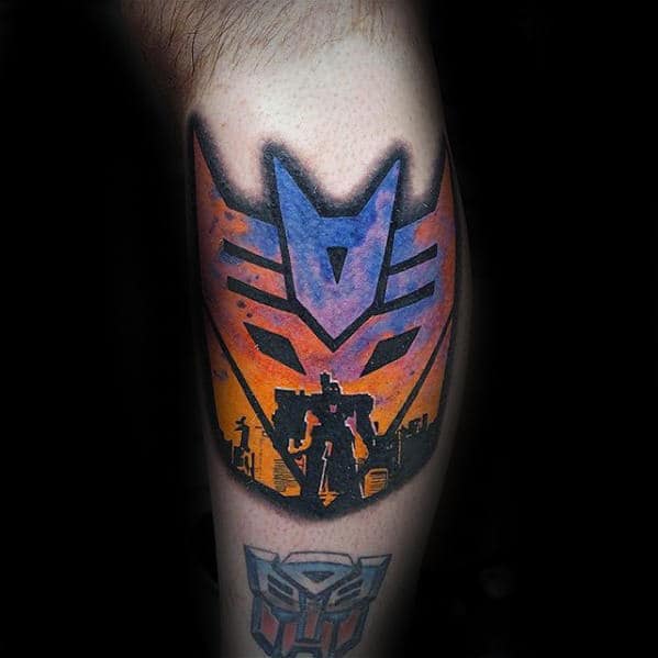 Small Leg Calf Guys Transformers Symbol Tattoo Design