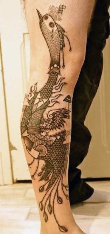 Leg tattoo of a stylized bird with intricate geometric and abstract patterns