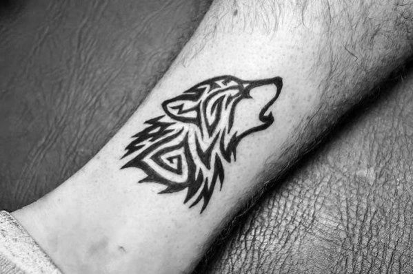 Small Leg Wolf Animal Tribal Tattoo Design Ideas For Males