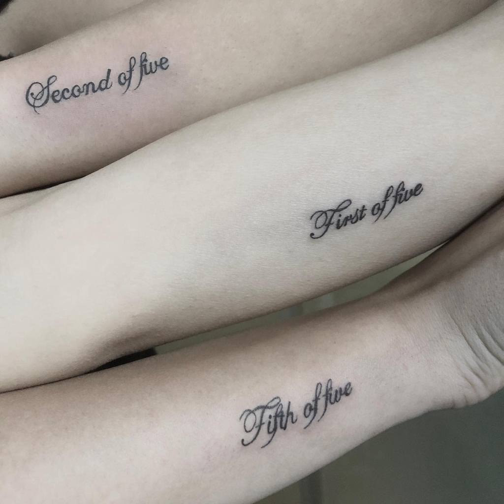 Matching sibling tattoos reading 'First of five,' 'Second of five,' and 'Fifth of five' in elegant cursive script