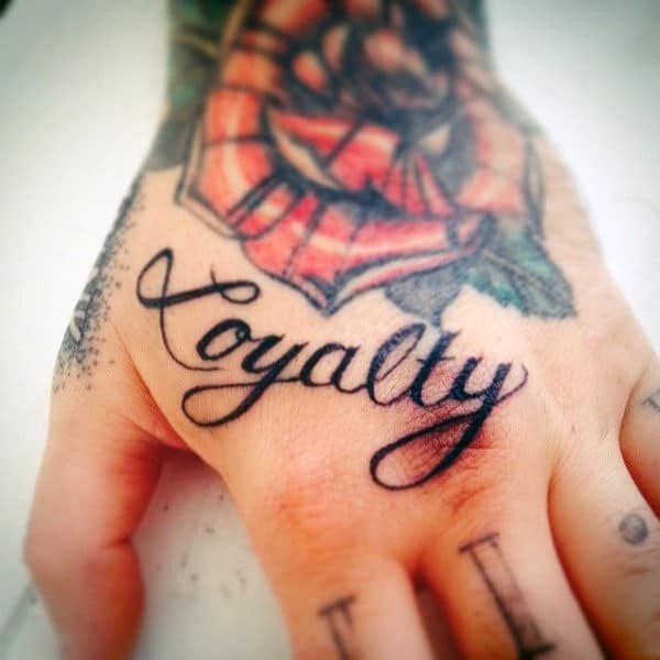Small Loyalty Male Hand Tattoo