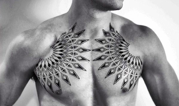 Intricate geometric tattoo across chest