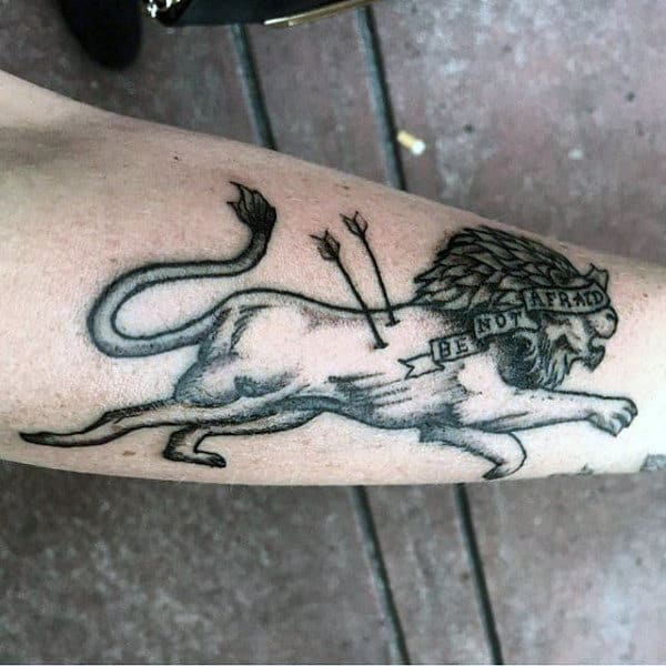 Small Men's Lion Tattoo With Arrows