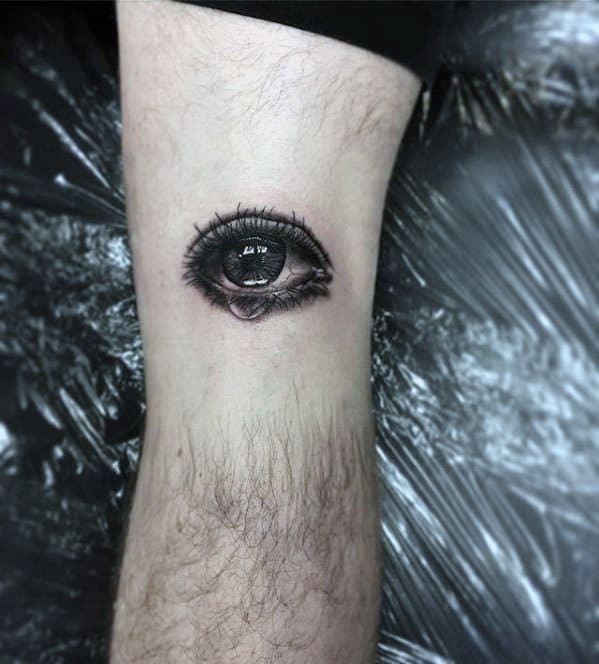 Small Mens Realistic Eye With Tear Leg Tattoos