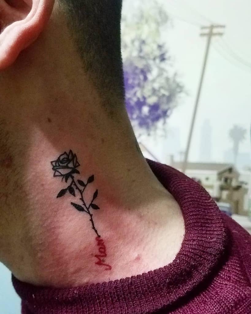 A striking neck tattoo featuring a black rose intricately entwined with the word "Mom," elegantly inked in vivid red