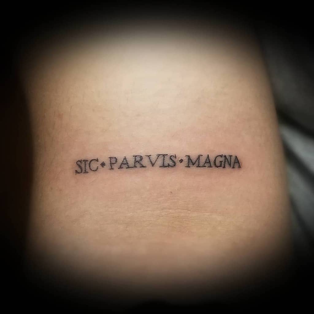 Small minimalist Sic Parvis Magna tattoo