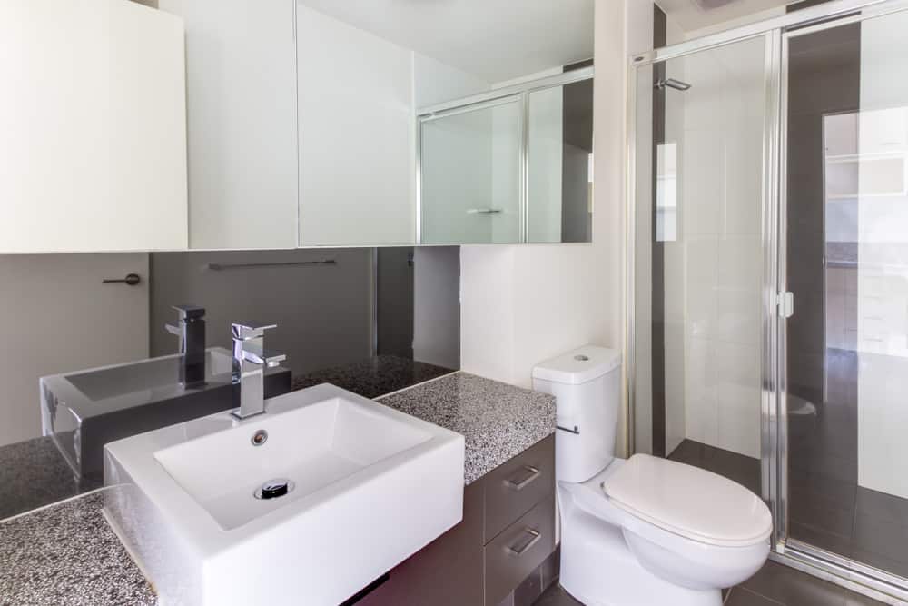 small modern bathroom with glass shower