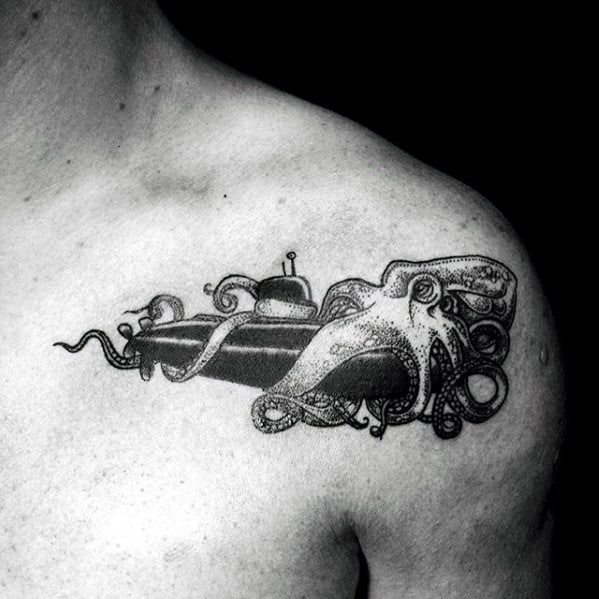 Small Octopus Wrapped Around Submarine Mens Chest Tattoo