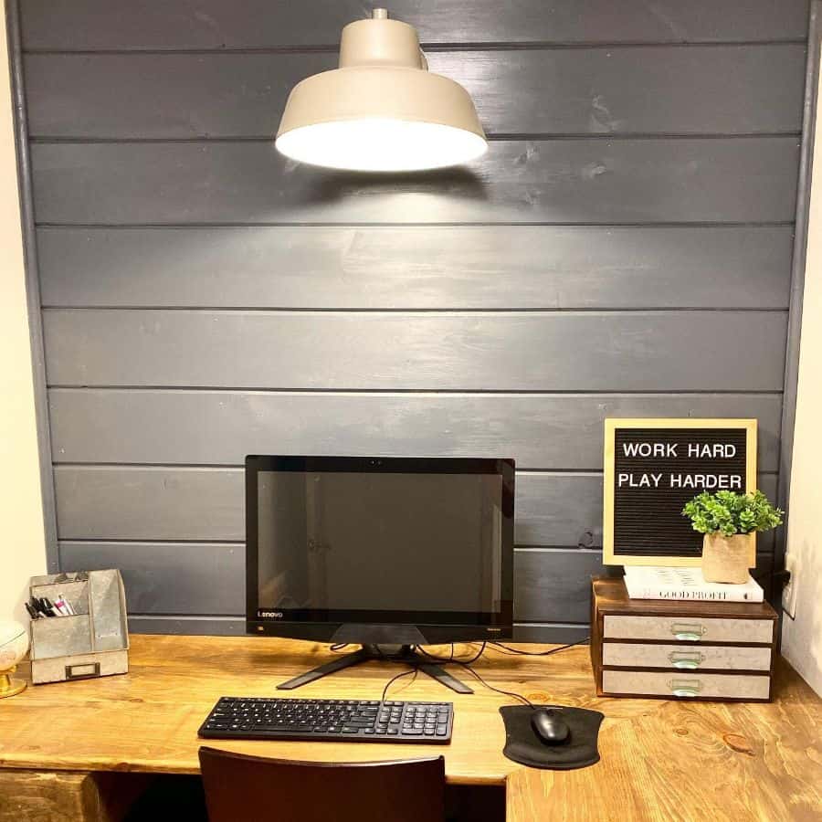 small home office space gray shiplap walls wood corner desk